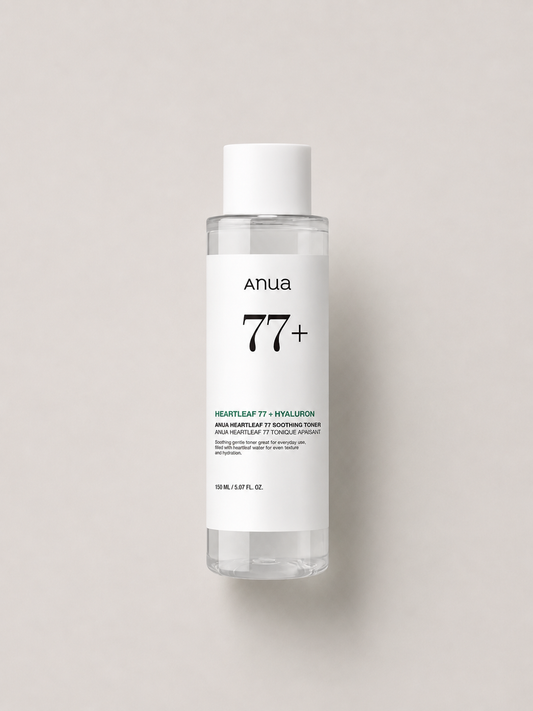Korean Skincare - Anua  Heartleaf 77+ Hyaluron Soothing Toner in a transparent bottle with a white cap and white label, centered against a light greige background. 150 ml.