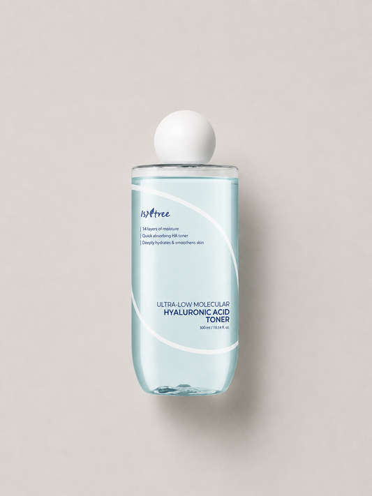 A bottle of korean skincare - Isntree Ultra-Low Molecular Hyaluronic Acid Toner with a white spherical cap, set against a solid light gray background. 300 ml.