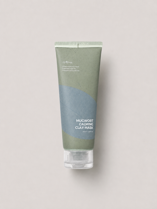 A korean skincare tube of Isntree Mugwort Calming Clay Mask, featuring a sage green and dusty blue color-blocked design with a clear cap, set against a solid light gray background. 100 ml.