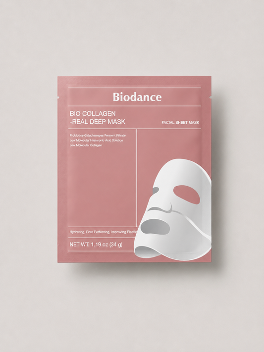 Korean skincare - Biodance Bio Collagen Real Deep Mask facial sheet mask pouch in a dusty pink color, featuring a white graphic of the mask on the front, set against a light gray background.